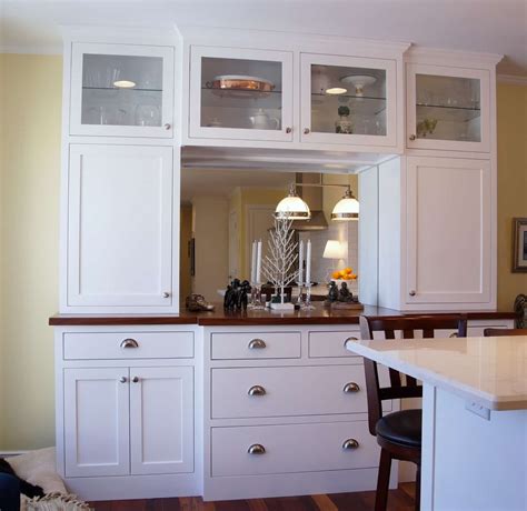 stacked kitchen cabinets with glass